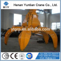 Scrap metal grab with crane for large, pig iron castings, ore to scrap, iron powder